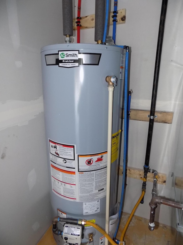 14 Carnival Ln, Centralia, MO 65240 - utility room with water heater