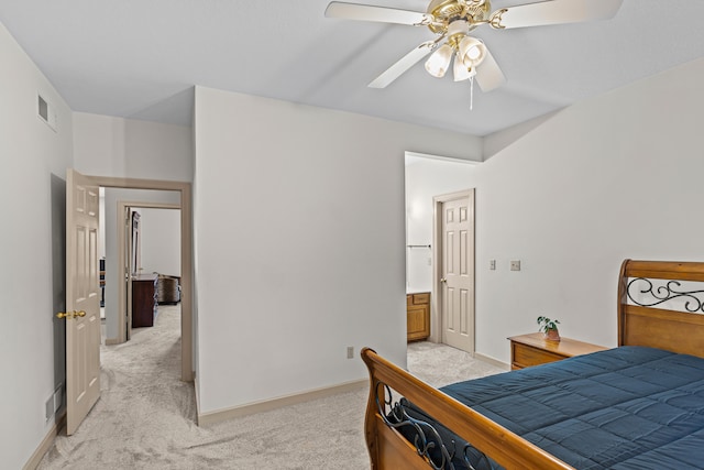 bedroom with light carpet and ceiling fan