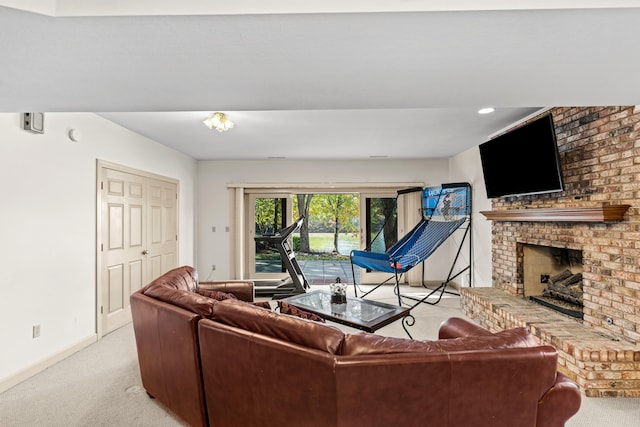 carpeted living room with a brick fireplace