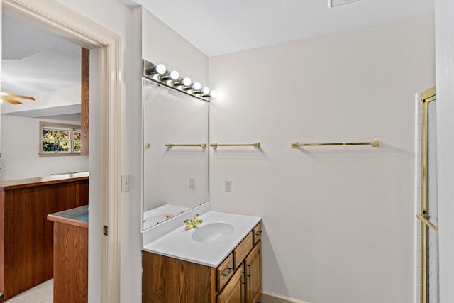 bathroom featuring vanity and ceiling fan