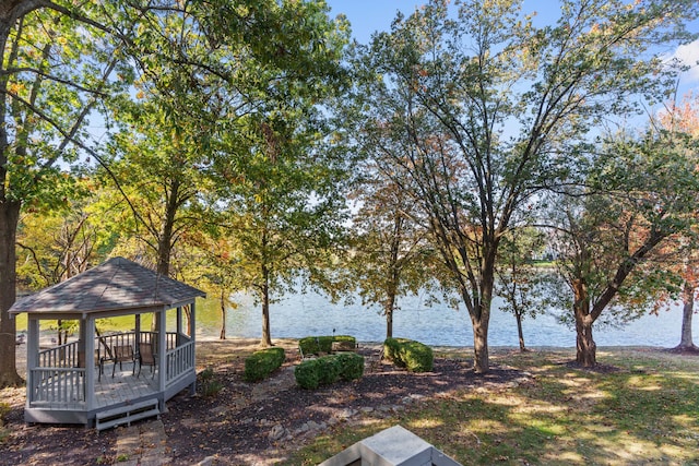 view of yard with a gazebo and a water view