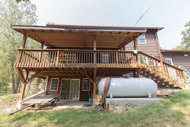 back of house with a patio area and a wooden deck