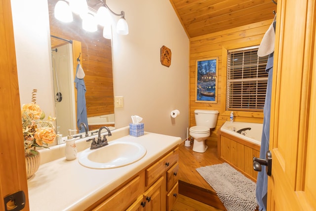 full bathroom featuring toilet, wooden walls, vanity, wood-type flooring, and shower with separate bathtub