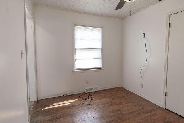 unfurnished room with ceiling fan and hardwood / wood-style flooring