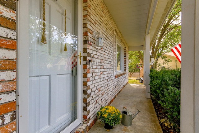 doorway to property with covered porch