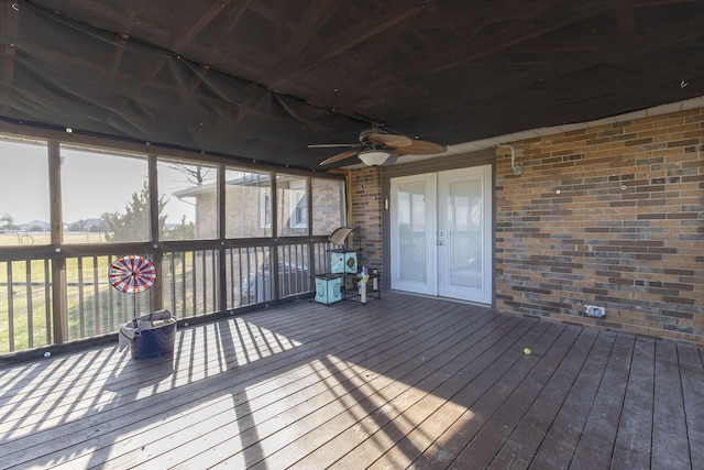 deck featuring ceiling fan and french doors