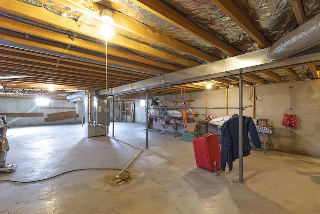 basement featuring heating unit