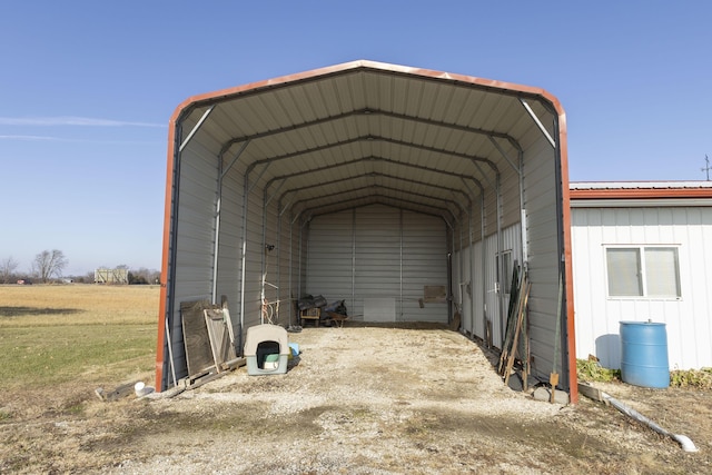 view of outbuilding with a carport