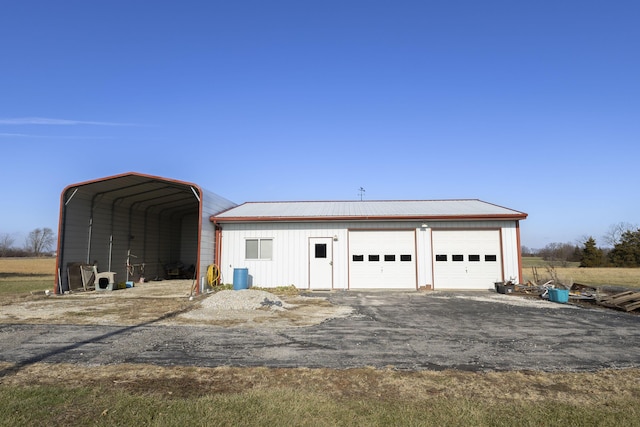 garage with a carport