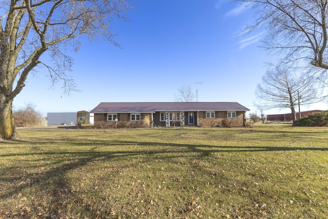 ranch-style house with a front lawn