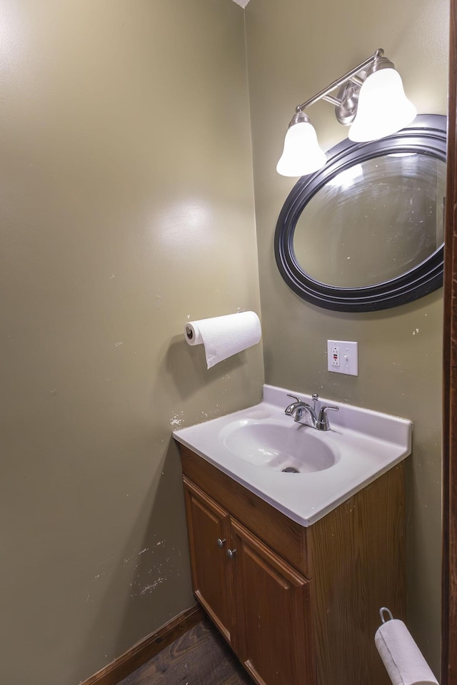 bathroom featuring wood-type flooring and vanity