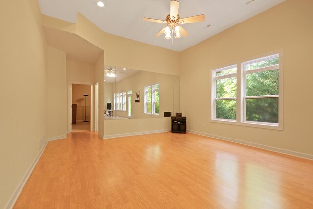 empty room featuring ceiling fan and light hardwood / wood-style flooring