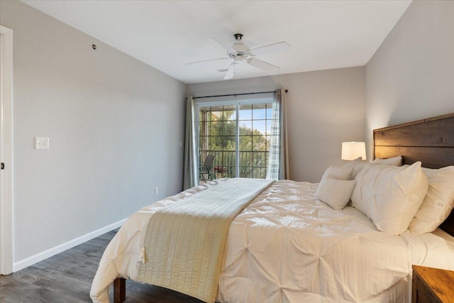 bedroom with dark wood-type flooring, ceiling fan, and access to exterior