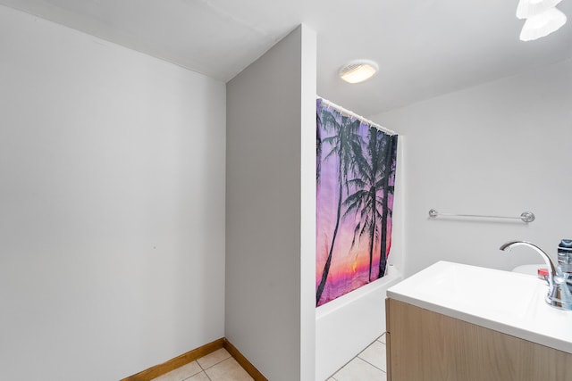 bathroom with shower / bath combo, vanity, and tile patterned floors