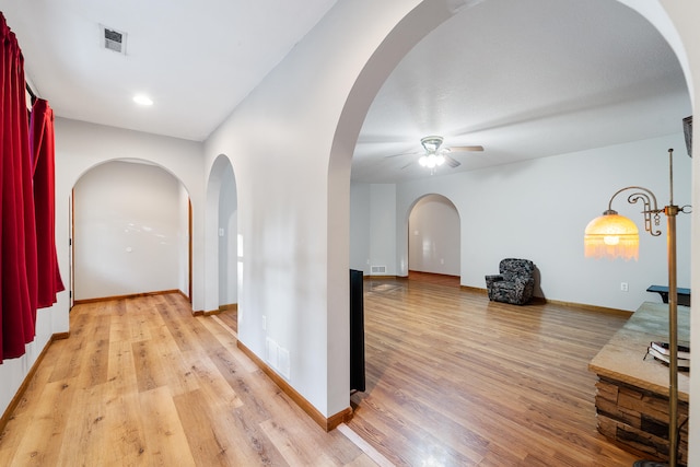 hallway featuring light hardwood / wood-style flooring