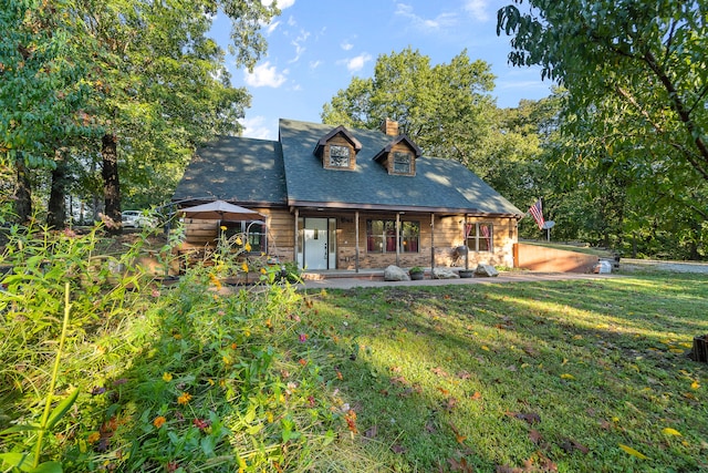 exterior space with a front lawn