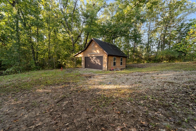 view of outdoor structure featuring a garage