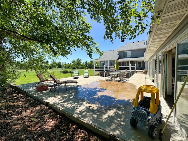 4200 S Rangeline Rd, Columbia, MO 65201 - view of patio / terrace featuring outdoor dining space and a sunroom