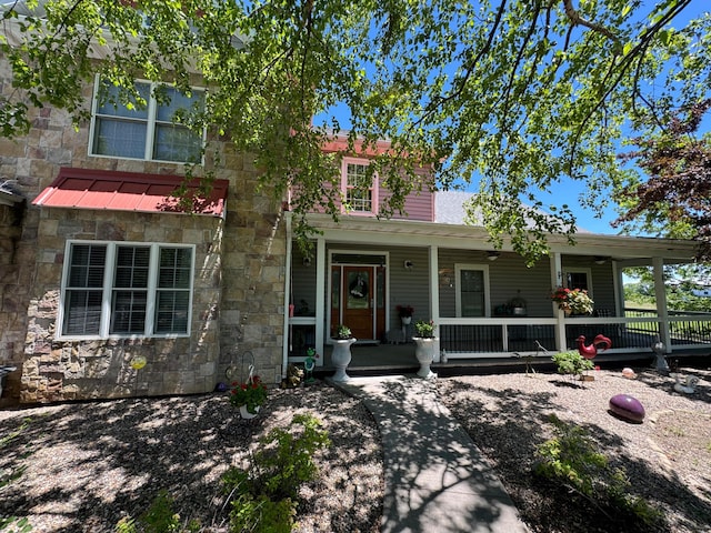 4200 S Rangeline Rd, Columbia, MO 65201 - view of front of house with stone siding and a porch
