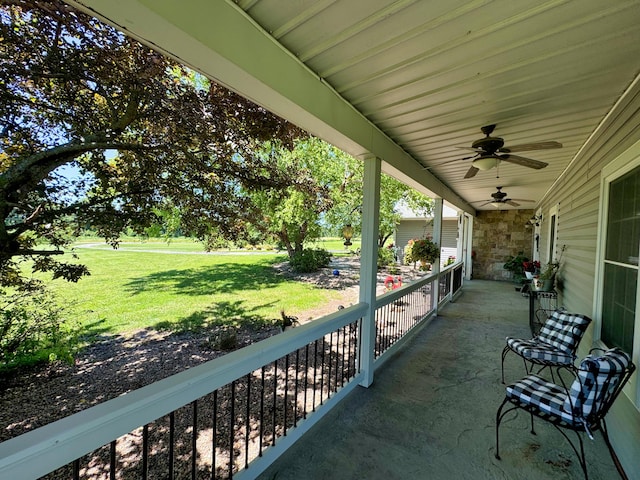 4200 S Rangeline Rd, Columbia, MO 65201 - view of patio / terrace featuring a ceiling fan and a porch