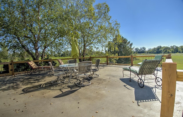 4200 S Rangeline Rd, Columbia, MO 65201 - view of patio / terrace with view of scattered trees and outdoor dining area