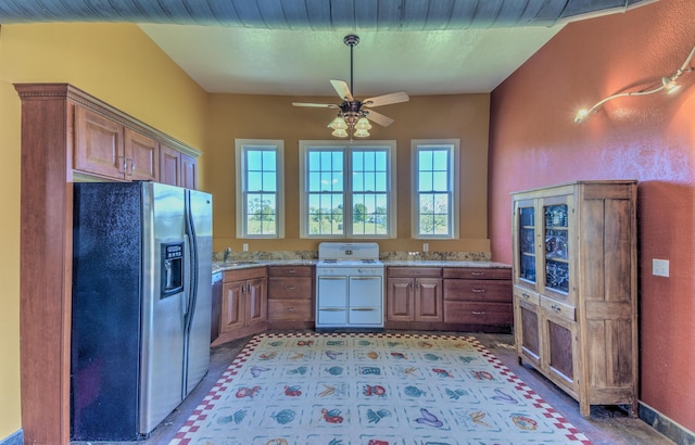 4200 S Rangeline Rd, Columbia, MO 65201 - kitchen featuring stainless steel refrigerator with ice dispenser, range with two ovens, plenty of natural light, and ceiling fan
