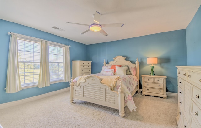 4200 S Rangeline Rd, Columbia, MO 65201 - bedroom with light carpet, baseboards, and ceiling fan
