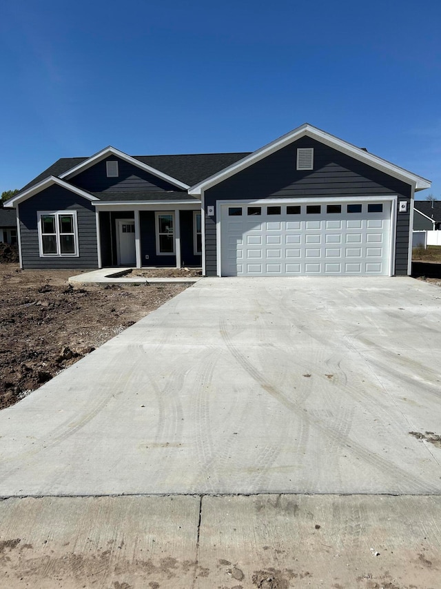 single story home featuring a garage