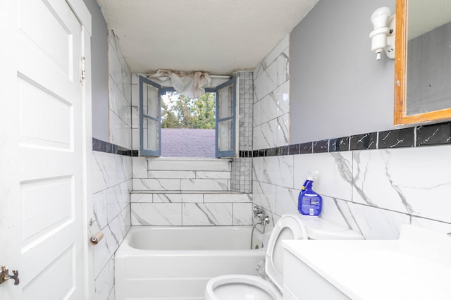 full bathroom featuring a textured ceiling, decorative backsplash, vanity, and toilet