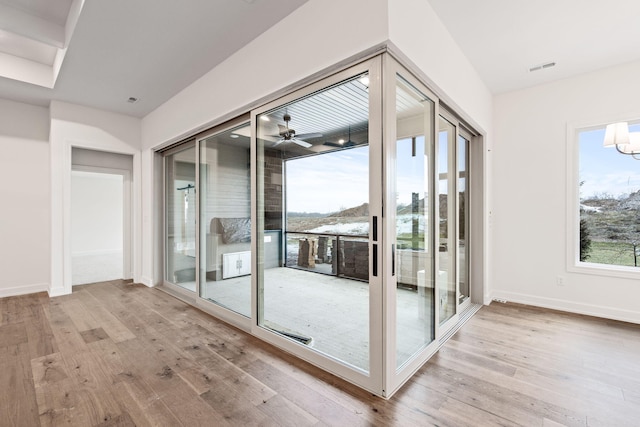 entryway featuring light hardwood / wood-style floors and ceiling fan