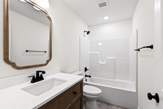 full bathroom with shower / tub combination, vanity, and toilet