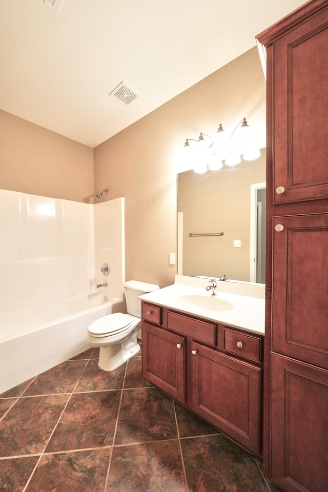 full bathroom with tub / shower combination, vanity, tile patterned flooring, and toilet