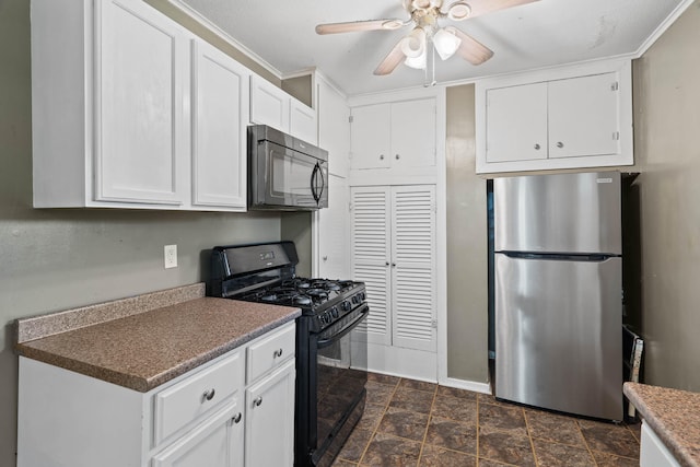 kitchen featuring ceiling fan, ornamental molding, white cabinetry, and black appliances