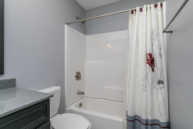 full bathroom featuring toilet, shower / tub combo, and vanity