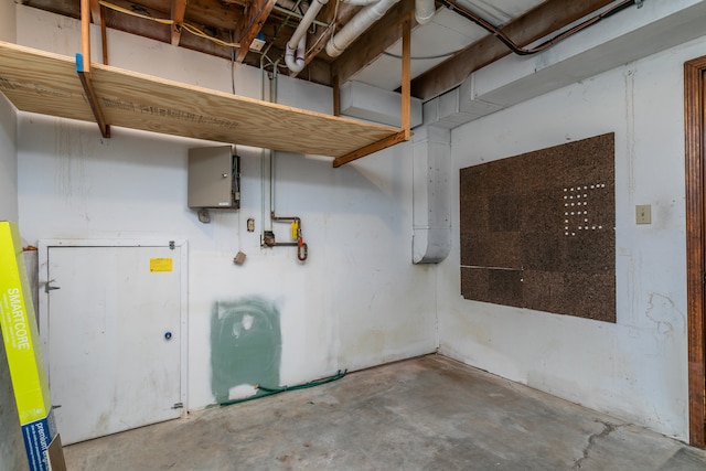 basement featuring water heater