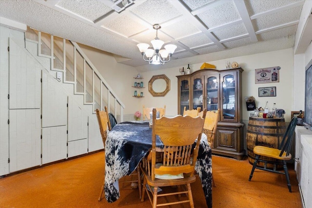 dining space featuring a chandelier