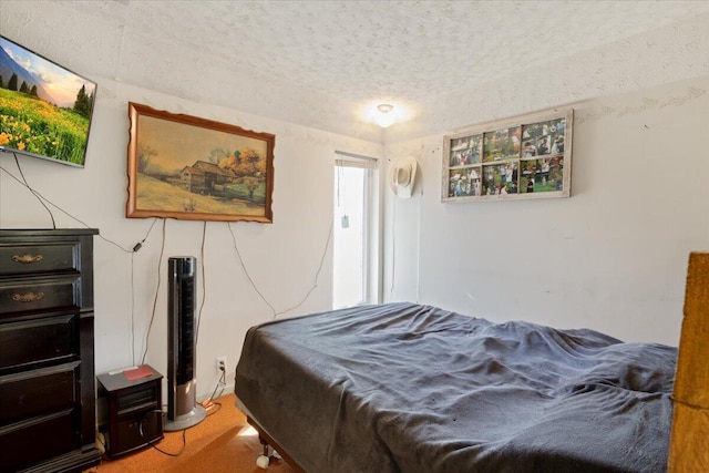 bedroom with a textured ceiling