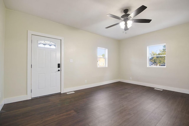 entrance foyer featuring ceiling fan and dark hardwood / wood-style flooring