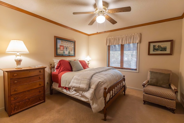 bedroom with ornamental molding, ceiling fan, carpet, and a textured ceiling