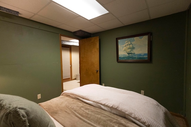 bedroom featuring a drop ceiling