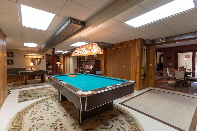 rec room featuring wood walls, a paneled ceiling, and pool table