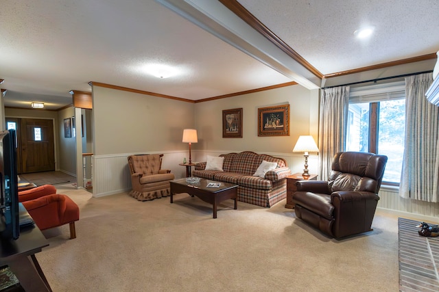 living room featuring light colored carpet, crown molding, wood walls, and a textured ceiling