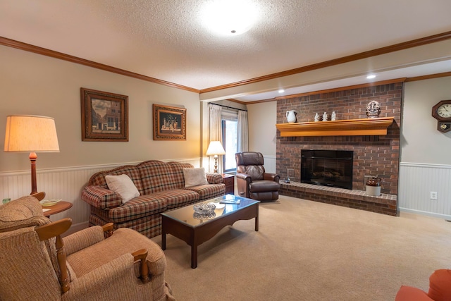 carpeted living room with a brick fireplace, ornamental molding, wooden walls, and a textured ceiling