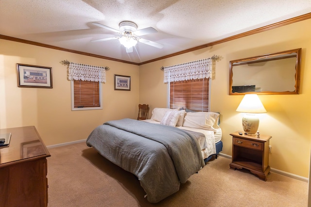 carpeted bedroom with crown molding, a textured ceiling, and ceiling fan