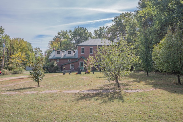 view of front facade with a front yard