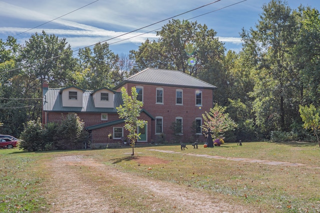 view of front of house with a front yard