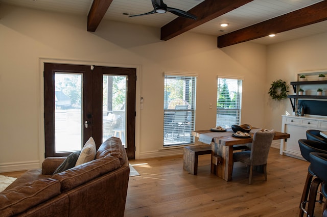 dining room featuring light hardwood / wood-style flooring, french doors, lofted ceiling with beams, and ceiling fan