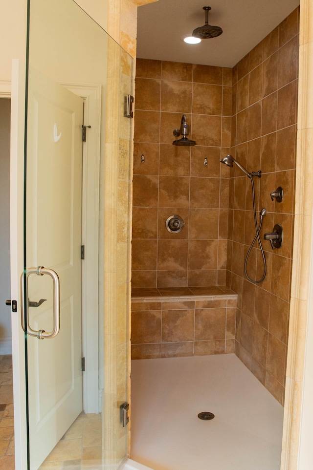 bathroom featuring an enclosed shower