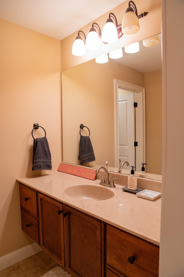 bathroom with vanity and tile patterned floors