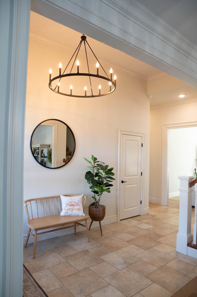 corridor featuring crown molding and a chandelier